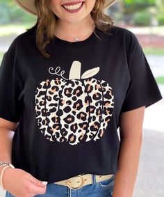 What a cute leopard pumpkin tee for the fall season! Wear it to the pumpkin patch and fall festivals! Available on a short or long sleeve tee. 
* 6 oz., 100% preshrunk cotton * Classic fit * Seamless double needle 7/8" collar * Taped neck and shoulders * Double needle sleeve and bottom hems * Quarter-turned to eliminate center crease Casual Leopard Print T-shirt For Fall, Trendy Black T-shirt For Fall, Fall Leopard Print Cotton Tops, Leopard Print Cotton Tops For Fall, Fall Leopard Print Graphic T-shirt, Leopard Pumpkin, Fall Festivals, Cute Leopard, Pumpkin Shirt