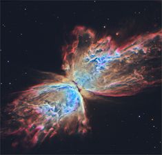 an image of a butterfly shaped object in the sky with bright colors and stars around it