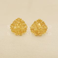 Elevate your style with these beautifully handcrafted gold earrings. Featuring a classic design and a comfortable fit, they add a refined touch to any look. Ideal for everyday wear or special occasions, they bring a subtle yet sophisticated sparkle. 18K Gold Stud Earrings Metal is Real Gold Purity is 18kt Weight is 1.82 grams approx Max Length is 1.2 cm approx Max width is 1.2 cm approx ,  The Earrings comes with normal backs if you need gold screw please contact Please feel free to ask if you h Earrings Metal, Gold Stud Earrings, Gold Stud, Gold Earrings Studs, Gold Studs, Real Gold, Earrings Jewelry, Jewelry Earrings Dangle, Classic Design