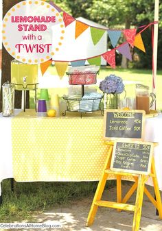 a lemonade stand with a twist sign in front of it on a table outside