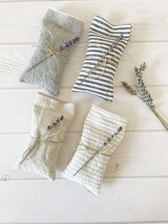 four pieces of cloth tied together with twine and lavender sprigs on the side