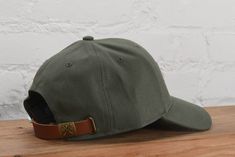 Be effortlessly cool with the Jade Canvas Hat. Made of durable canvas, this hat features a faux leather 'sota' patch and an adjustable strap for the perfect fit. Perfect for any adventure and guaranteed to elevate your style game. - 100% Polyester - One size - Spot clean recommended - Designed in Minnesota - Imported Retail: $30 Adjustable Canvas Baseball Cap With Curved Bill, Casual Leather Six-panel Baseball Cap, Adjustable Canvas Dad Hat With Curved Bill, Urban Hat With Curved Brim And Adjustable Fit, Urban Adjustable Hat With Curved Brim, Casual Leather Baseball Cap With Curved Brim, Adjustable Canvas Hat With Curved Bill, Adjustable Flat Bill Hat In Khaki, Adjustable Canvas Baseball Cap