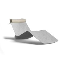 an object that looks like a chair with a roll of paper on top of it