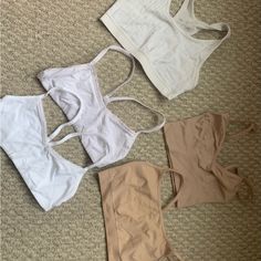 Lot Of 5 Bralettes / Bras Includes One Brand New, Never Worn Size Xs White Gap Bralette, One Xs Gap White Bralette (Worn But Good Condition), One Scoop Neck Off White Aerie Bralette, One Gap Love Xs Tan Seamless Bralette And One Size Xxs Tan. Smoke Free Home. Good Condition! Hard To Find This Size So This Makes For A Great Deal! White Sports Bra With Built-in Bra For Summer, Seamless Sports Bra For Everyday Summer Wear, Summer Cami Sports Bra For Loungewear, Casual Everyday Summer Bra, White Cami Crop Top With Built-in Bra, Stretch Bra For Everyday Spring Use, White Cotton Sports Bra For Spring, Summer Everyday Bra, White Sports Bra With Removable Pads