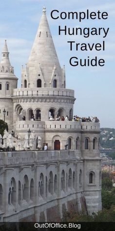 the complete hungarian travel guide is shown in front of a blue sky and white castle