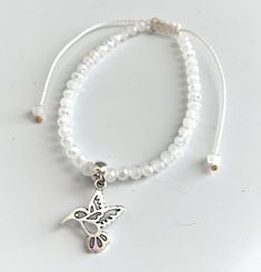 Hummingbird Charm White Sparkling Glass Beads Adjustable Bracelet Wax Cord | eBay Hummingbird Bracelet, Bangles Style, White Bracelets, Handmade Jewelry Diy, Faceted Glass, Adjustable Bracelet, Anklets, Friendship Bracelets, Glass Beads