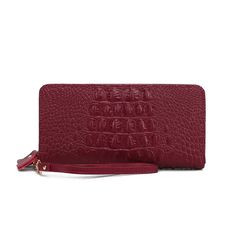 Introducing our Eve Crocodile- Embossed Wallet with detachable wristlet- an exquisite accessory that exudes sophistication and luxury. Crafted from genuine leather with a stunning crocodile embossed texture, this wallet is a timeless piece that combines style with practicality. The double top zippers open to reveal a meticulously organized interior, offering both elegance and functionality. The first compartment is designed with your everyday needs in mind, featuring 8 card slots for ample card Elegant Handheld Wallets For Daily Use, Elegant Handheld Wallet For Daily Use, Elegant Wallet With Crocodile Pattern, Elegant Rectangular Wallet With Crocodile Pattern, Elegant Handheld Wallets With Card Slots, Elegant Handheld Wallet With Card Slots, Elegant Leather Wristlet With Card Slots, Elegant Wristlet With Card Slots For Gift, Card Storage