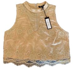 A Beautiful New With Tags Top By Romeo + Juliet Couture. Tag Says Champagne But Could Also Be Described As A Muted Gold. Embellished With A Scrollwork Of Tiny Gold Beads, This Top Is A Unique And Lovely Piece For Any Wardrobe. V-Neck With Overlay. Full Zip Back. Reasonable Offers Always Welcome. Established, Reliable Seller. Fast Shipper. From Clean, Smoke And Pet-Free Home. Bundle Items And Save$$$. Elegant Sequined Crop Top For Summer, Elegant Gold Crop Top For Spring, Elegant Lace Crop Top For Night Out, Beige Lace Top For Party, Elegant Embellished Crop Top For Spring, Beige Fitted Lace Top For Party, Sleeveless Lace Top For Spring Party, Beige Lace Top For Spring Party, Summer Embellished Lace Top