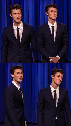 a man in a suit and tie posing for pictures on the set of tonight show