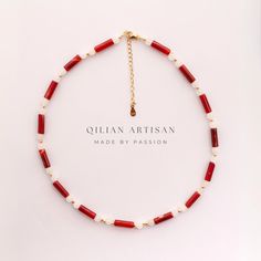 *Handcrafted Excellence: Each piece is meticulously handmade, ensuring a personal touch in every choker necklace. *Adjustable Size: Features a 14-inch choker length with a 5cm extension chain for customizable fitting. *Exclusive Design: Designed exclusively by me, this choker showcases a unique blend of creativity and craftsmanship. Key Highlights of the "Red Agate & White Jade" Choker Necklace: *Main Materials: This unique choker necklace is primarily made of red agate and white jade. The combination of these materials gives the necklace a distinctive style and profound meaning. *Red Agate: The cylindrical red agate pieces are deeply polished and intricately carved, setting the tone for the overall design with their vibrant color and natural beauty. The rich red hue of the agate exudes wa Jade Choker, Unique Choker Necklaces, Unique Choker, Stone Beaded Necklace, Necklace Pearl, White Jade, Red Agate, Necklace Dainty, Handmade Necklace