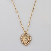 Elegant Jewelry With Logo Charm Heart Pendant, Elegant Jewelry With Heart Pendant And Logo Charm, Elegant Heart Pendant Jewelry With Logo Charm, Gold Heart Jewelry With Logo Charm, Gold Heart-shaped Jewelry With Logo Charm, Heart Shaped Pendant, Gg Logo, Heart Shape Pendant, Pearl Pendant Necklace