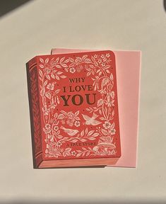 a red book with the words why i love you on it