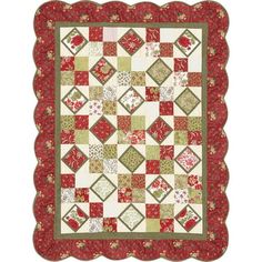 a red and green quilted table runner