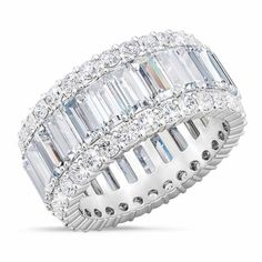 A stunning eternity ring sparkling with your birthstone!Lavishly plated with shimmering silver and over 50 dazzling simulated diamonds.Birthstone Beauty adds style and sophistication to any attire.A sumptuous, satin-lined presentation case is included at no additional charge - perfect for gift-giving and safekeeping. Luxury Half Eternity Ring With May Birthstone, Silver Baguette Cut Eternity Band Promise Ring, Baguette Cut Cubic Zirconia Eternity Band For Anniversary, Promise Eternity Band With Diamond Accents In Cubic Zirconia, Promise Ring Cubic Zirconia Eternity Band With Halo, Cubic Zirconia Halo Eternity Band Promise Ring, Cubic Zirconia Eternity Band With Halo For Promise, Baguette Cut Cubic Zirconia Channel Set Eternity Band, Cubic Zirconia Baguette Cut Channel Set Eternity Band