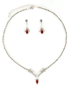 This jewelry set is stunning! It is encrusted with clear, sparkling rhinestones along a silver plate. The necklace measures approximately 15" long. The matching Earrings measure 1.0" long. It is perfect for weddings, proms, formals, parties, pageants, and more. It coordinates with any color or style wedding dress or formal ensemble. V Necklace, Ju Ju, Piercings Jewelry, Earrings Crystal, Beading Jewelry, Princess Wedding, Style Wedding, Matching Earrings, Crystal Earrings