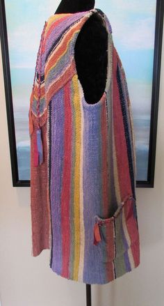 A stunning open style long vest by Santa fe fibre artist Gretel Underwood. Excellent clean condition.Handwoven soft cotton chenille with concho ribbon accents. Art to wear. Unmarked for size. Please read measurements. L/XL. Shoulder 17" Bust 44" Waist 48" Hip 50" Length 34" Paypal Payments Only Please! When auction concludes payments must be made within 3 days. Immediate Payment Appreciated. “Buy It Now” items must be paid immediately.  If you have a broken item or feel the item was misrepresent Fibre Artist, Wearable Art Clothing, Art Clothing, Long Vest, Long Vests, Art To Wear, Weaving Patterns, Art Clothes, Santa Fe