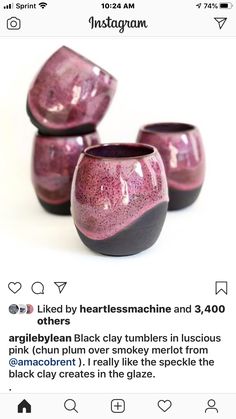 three purple vases sitting on top of each other