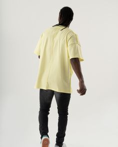 Looking for something casual and summery? This yellow T-shirt with reverse seams and a front graphic is perfect for your next outing! FEATURES- Regular Cut- Smooth Feel- Comfort Fit SIZE RECOMMENDATIONModel's height and weight: 185 cm and 70 kg. (6 feet & 154 lbs)Model wears size: L Urban Short Sleeve Tops For Spring, Yellow Crew Neck Summer Shirt, Casual Yellow Shirt With Relaxed Fit, Urban Yellow Summer Tops, Urban Style Short Sleeve T-shirt For Spring, Urban Drop Shoulder Tops For Spring, Urban Drop Shoulder Spring Tops, Spring Urban Drop Shoulder Tops, Urban Style Yellow Tops With Graphic Print