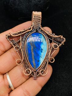 Rare Blue Flash Labradorite Copper Pendant/ Labradorite Gemstone Copper Wire Wrap Pendant Jewelry/ Gift Pendant/ Oxidize Polish Pendant  Use 70FORYOU Coupon Code For Get 70% Off On All Items  Handmade Copper Chain Size 18-20 - 22 Centimeter https://www.etsy.com/in-en/listing/1166071577 Welcome to our little shop, where you can find handmade copper wire jewelry and more, for you and your loved ones. We do accept custom orders also, kindly message us for more. Rare Blue Flash Labradorite Gemstone Copper Wire Wrapped Handmade Pendant A copper I wrapped on a beautiful Rare Blue Flash Labradorite Gemstone . Gemstone : Rare Blue Flash Labradorite Pendant length : 7. Centimeter Metal : Copper  Gemstone : Natural # Protection:- Copper will be tarnished after a while so try to limit contact with lo Copper Wire Jewelry, Wire Wrap Pendant, Copper Pendant, Blue Labradorite, Copper Chain, Copper Pendants, Handmade Copper, Labradorite Pendant, Wrapped Pendant