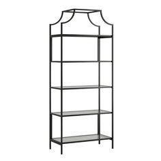 an iron shelf with glass shelves on top and bottom, in the shape of a trellis