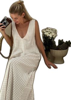 Beige V-neck Linen Dress For Beach, Chic V-neck Linen Dress For Day Out, Summer Linen V-neck Dress For The Beach, Chic Beige Maxi Dress For Beach Season, Chic V-neck Linen Beach Dress, Chic V-neck Linen Dress For Beach, Casual Linen V-neck Beach Dress, Beige V-neck Sleeveless Dress For Vacation, V-neck Sleeveless Dress For Summer Beachwear