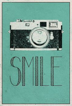 an old fashioned camera with the words smile on it's front and bottom corner