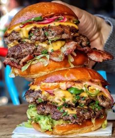 two hamburgers stacked on top of each other