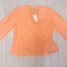 A New Day Women's Size Xxl 3/4 Sleeve Peach Wrap Top Blouse 100%Cotton. E4#2069 Spring Workwear Blouse With 3/4 Sleeves, Peach Long Sleeve Cotton Top, Long Sleeve Peach Cotton Top, Summer Workwear Blouse With 3/4 Sleeves, Orange Relaxed Fit Top For Work, Workwear Orange Top With Relaxed Fit, Pink 3/4 Sleeve Top For Work, Peach Long Sleeve Blouse For Brunch, Casual Orange Top With 3/4 Sleeves