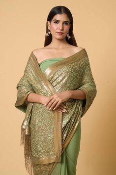 Forest green saree with multi colored sequin embroidery. Comes with coordinating sequined unstitched blouse piece. - Aza Fashions Festive Chanderi Dupatta With Sequins, Green Sequined Traditional Wear For Eid, Tissue Silk Dupatta With Sequins For Reception, Elegant Dola Silk Dupatta With Sequins, Green Blouse Piece With Mirror Work For Party, Designer Sequin Dupatta For Diwali, Green Sequined Traditional Wear For Navratri, Green Traditional Wear With Sequins For Navratri, Celebration Silk Dupatta With Sequins