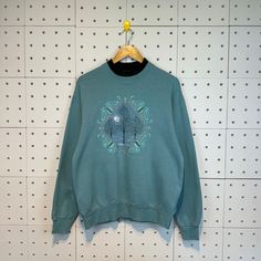 "Vintage 90s Morning Sun Sweatshirt Morning Sun Crewneck Morning Sun Sweater Big Print Medium Size Green *50% Cotton. *50% Polyester *Made in Usa *Tag reads:  Size : Medium (check measurements below) *Manual size measurement  Width : 22\" inches (armpit to armpit)                           Length : 26.5\" inches  All measurements are taken with the garment flat on the ground. *Condition: Good Conditions  No Defects  (9/10-90%) *OUR SHIPPING PRICE IS 25$ FOR EXPRESS SHIPPING (DHL EXPRESS).  FOR EXPRESS SHIPPING IT WILL TAKES ONLY 2-5 DAYS TO DELIVERED TO YOU.  ANY QUESTION PLEASE CONTACT US.  PLEASE SHOPPING WITH US WITH CONFIDENCE.  WE ARE TRUSTED SELLER, WE WILL GIVE THE GREAT SERVICE FOR YOU. Thanks!" 90s Crew Neck Top For Winter, 90s Style Relaxed Fit Winter Tops, Morning Sun, Medium Size, Vintage 90s, Gender Neutral, Perfect Fit, Bathing Beauties, Adult Outfits