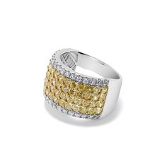 This exceptional ring features 60 radiant fancy yellow diamonds, totaling 3.95 carats, which exude a warm and captivating glow. Complementing these radiant yellow diamonds are 34 brilliant round white diamonds, totaling 0.71 carats, adding a touch of sparkle and contrast to the design. Perfect for making a bold and stylish statement, this cuff ring is sure to elevate any ensemble with its unique blend of colors and sophistication 60 Radiant Fancy Yellow Diamonds (3.95CT) 34 Brilliant Round Diamonds (0.71CT) 18KT Yellow and White Diamonds Diamond Cuff Ring, Diamond Cuff Bracelet, Yellow Diamonds, Fancy Yellow Diamond, Cuff Ring, Cuff Rings, Yellow Diamond, White Diamonds, White Diamond