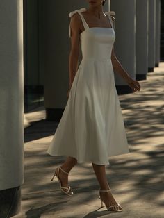 LICHI - Online fashion store :: Ribbon-strap satin midi dress White Cocktail Dress Classy Midi, Grad Dress Mid Length, Formal Dresses Midi Elegant, Bow Tie Sleeve Wedding Dress, Champagne Rehearsal Dinner Dress, Rehearsal Dinner Dress Classy, Fit And Flare Dress Formal Midi, Satin Western Dresses, Elegant Graduation Dress Classy