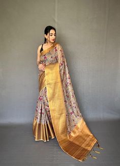 Description:   Embrace tradition with our Pattu Kalamkari saree, featuring a stunning brocade blouse and a contrast pallu adorned with intricate jari weaving.   Experience the luxury of smooth silk, beautifully enhanced by exquisite Kalamkari prints and embossed jari detailing.   The saree boasts a woven border, complemented by a stylish contrast blouse and pallu.   Stunning Kalamkari digital print adds a modern touch to timeless elegance.   Fabrics that speak to your soul   Hurry, book yours today! Luxury Multicolor Kalamkari Print Sets, Navratri Meenakari Tussar Silk Pre-draped Saree, Wedding Pre-draped Kalamkari Print Semi-stitched Saree, Wedding Pre-draped Kalamkari Saree Semi-stitched, Wedding Pre-draped Kalamkari Print Saree, Wedding Pre-draped Semi-stitched Kalamkari Saree, Wedding Pre-draped Kalamkari Saree, Gold Pre-draped Jamawar Saree With Zari Work, Gold Pre-draped Saree With Cutdana In Jamawar