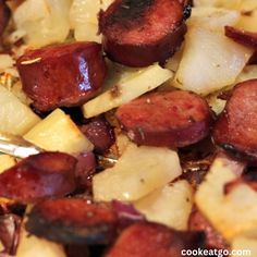 cooked sausage and potatoes on a plate ready to be eaten