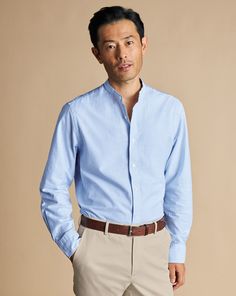 100% cotton, Available in slim fit, Collarless, Mitred button cuff with two buttons, Oxford Weave, Mid-weight, Split back yoke, Machine washable - Collarless Stretch Washed Oxford Stripe Shirt - Ocean Blue | Men's Charles Tyrwhitt Collarless Stretch Washed Oxford Stripe Casual Shirt - Ocean Blue Single Cuff Size Large Cotton Collarless Shirt, Charles Tyrwhitt, Stripe Shirt, Bold Stripes, Oxford Shirt, Look Casual, Ocean Blue, Sleeves Pattern, Casual Shirt