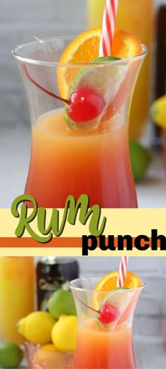 a pitcher filled with orange juice and garnished with a cherry on the top