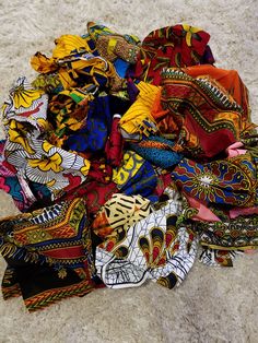 DESCRIPTION Scraps of African Ankara Print Fabric. This quality African print is 100% cotton. It's ideal for making African Clothing, African quilts, Upholstery, for home decoration, quilting and many more. The listing is for half pound, one pound and two pounds of scraps African Ankara Fabric *Each scrap measures 8-12in in length and 36-44in in width. 1/2 pound of scraps has 4 pieces, 1 pound of scraps has 8 pieces and 2pounds of scraps has 16 pieces *If you require more than what I have listed African Batik Fabric, African American Quilts, African Quilts, Fabric Bed Frame, American Quilt, Head Wrap Headband, Ankara Print, African Ankara, Fabric Headbands