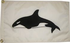 a black orca jumping out of the water on a white flag with gold trim