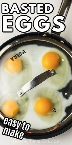 three fried eggs in a frying pan with the words basted eggs