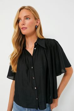 Cool, chic, and sophisticated- the Black Clemens Blouse is a closet must-have. Complete with an oversized collar and mother of pearl buttons, this top displays elegance and grace while still being functional and easy to style. Versatile enough to be dressed up or down, we are pairing this with a chunky necklace and black flats for the office, or with sneakers and shorts for a weekend picnic. 
Oversized collar
Flowy short sleeves
Front button placket
Relaxed fit
Semi-sheer lightweight fabric
Mate Black Silk Skirt, Casual Outfits For Moms, Oversized Collar, Flowy Shorts, Chunky Necklace, Silk Skirt, Mother Of Pearl Buttons, Pearl Buttons, Mom Outfits