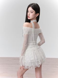 Make a romantic statement in the Off-Shoulder Lace Layered Mini Dress, designed to captivate and charm at any social gathering. This piece epitomizes effortless elegance with its meticulous lace craftsmanship and delicate off-shoulder silhouette.
Crafted from a blend of high-quality materials, the dress features a 90% nylon and 10% spandex fabric composition for a comfortable stretch fit, while the inner lining is a soft blend of 91.8% viscose and 8.2% spandex for the top, and 100% polyester for Cake Skirt, Skirt Lining, Lace Layers, Top Skirt Set, Elegante Casual, Crop Top Skirt, White Skirt, Layered Skirt, Yemen