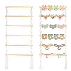 a wooden rack with several different types of hair clips hanging from it's sides