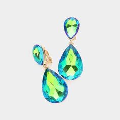 Crystal Green Double Teardrop Clip-on Gold EarringsItem: Clip-On EarringsBrand: Sparkle Armand Size: 0.75" X 2" (Inches) Color: Green, Gold Metal: Alloy, Lead & Nickle Free Material: Crystal Theme: Evening, Bridal, Prom, Pageant All Measurements Are Approximate. Sold As One Pair Of Earrings Pageant Earrings, Crystal Green, Bling Necklace, Loop Earrings, Green Crystal, Green Crystals, Green Glass, Crystal Earrings, Clip On