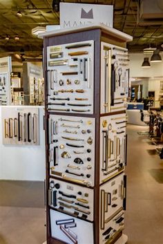 a display case filled with lots of different types of tools in a store or showroom