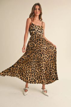 Flatter Everyone In This Eyepopping Dress Product Description: Ready to unleash your wild side? Look no further than our Belle Leopard Dress! This sleeveless, pleated dress features a fierce leopard print that will make you stand out in any crowd. Perfect for all your casual and classy occasions. (Meow!) Fit: Model is 5'7-1/2" and is wearing a size Small Material: 100% Polyester Casual Dinner Outfit Fall, Curvy Date Night Outfit, Air Clothes, Dinner Outfit Fall, Print Pleated Dress, Leopard Print Maxi Dress, Valentines Day Dresses, Leopard Dress, Pleated Maxi Dress