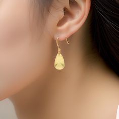 Natural Lemon Quartz Earring Teardrop Earring In 14k Solid Gold Earring Gemstone Earring Dangle Earring Dainty Earring Women Earring Gifts ----------------------------------------------------------------------------------------------------------------------------------------------------------------------------------- Item description - Stone - Lemon Shape - Teardrop Stone color - Lemon Stone Size - 25.10x15.75 MM Stone Weight - 32.10 Carat Stone Piece - 2  Material - In 14k Solid Gold Gemstone C Gemstone Earrings Dangle, Mom Earrings, Earring Dangle, Hippy Gifts, Solid Gold Earrings, Party Earrings, Lemon Quartz, Gold Earring, Quartz Earrings