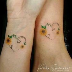 two sunflowers on the wrist are shown in this couple's matching tattoos