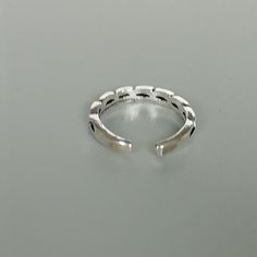 A sterling silver toe ring with twists.. 2mm wide. Weight: 0.95gm This is an open ended toe ring and can be adjusted to fit most feet. These toe rings are made of 925 hypoallergenic sterling silver. Comes with an oxidized finish. Please note this price is for ONE toe ring only. Sent in a gift box. I can include a personal message from you if needed You are welcome to contact me at... bhavnakwintra1956@gmail.com For more beautiful pieces from my shop, please browse 👇 TOE RINGS: https://www.etsy. Silver Minimalist Stackable Toe Rings, Minimalist Hypoallergenic Silver Toe Rings, Minimalist Silver Hypoallergenic Toe Rings, Silver Open Ring Toe Rings, Minimalist Silver Stackable Toe Rings, Silver Metal Open Toe Rings, Adjustable Silver Metal Toe Rings, Elegant Silver Metal Toe Rings, Silver Beads Metal Toe Ring