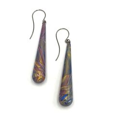 Add a pop of color to any outfit with our Willow Long Teardrop Earrings! These colorful earrings feature a unique long tear drop shape, making them a statement piece that will catch everyone's eye. Elevate your style with these vibrant and fashionable earrings. Earring measures 3" in length. Jewelry is made by hand with vintage lucite parts that were made in the US in the 1960's - early 80's. We hand-set them with surgical steel earring posts and they have sturdy surgical steel/acrylic backings on them as well. Light-weight & fun to wear. Multicolor Teardrop Whimsical Jewelry, Unique Handmade Multicolor Teardrop Earrings, Unique Teardrop-shaped Jewelry With Colorful Beads, Artsy Green Teardrop Earrings, Artsy Teardrop-shaped Earrings, Fashionable Earrings, Tear Drop Earrings, Surgical Steel Earrings, Long Drop Earrings