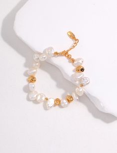 Step into a world of luxury with our Baroque Pearl Bracelet. Experience the unique luster and artisan craftsmanship that redefines elegance. 18K gold vermeil 925 sterling silver Freshwater pearls  Approx. length 16cm with 3cm extension Shiny Texture, Silver Pearl Bracelet, Pearl Jewelry Gift, Pearl Bracelet Gold, Pearls Bracelet, Gold Armband, Classic Bracelets, Stylish Bracelet, Freshwater Pearl Bracelet